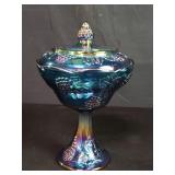 Carnival glass pedestal covered bowl