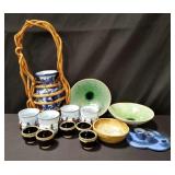 Group of pottery bowls, cups and vase
