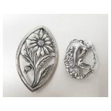Two sterling silver brooches