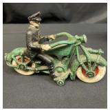 Vintage cast iron motorcycle police toy