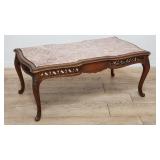 Vintage French carved walnut coffee table with