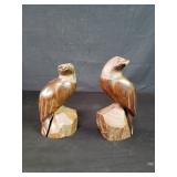Pair of carved iron wood eagle figures