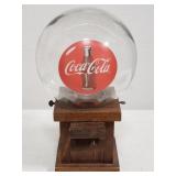 Vintage Coca-Cola glass globe on wood base