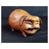 Carved wood pig figure