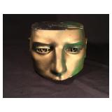 Vintage pop art composite face sculpture