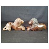 Carved iron wood lion figures