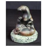 Bronze otters figure on marble base
