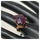 14k gold and purple gemstone ring