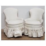Pair of vintage upholstered slipper chairs on
