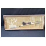 Framed blow gun replica in wall hanging shadow box