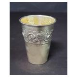 Sterling silver cup with floral motifs