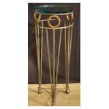 Modern metal plant stand with glass top