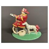 Vintage cast iron hand painted firefighter &