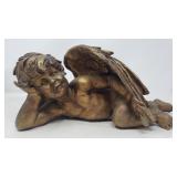 Ceramic cherub statue