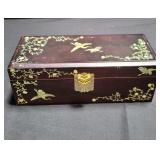 Asian lacquered jewelry box with intricate