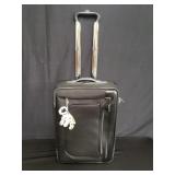 Tumi luggage with Dalmatian travel tag