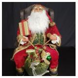 Large Santa Claus in chair Christmas decoration