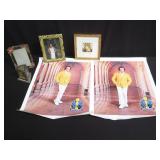 Group of picture frames and unframed photo print
