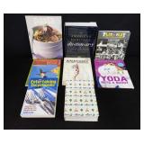 Group of books, cookbooks, dictionary, etc.