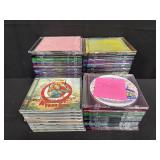 Box of mix tape CDs, some family photos and