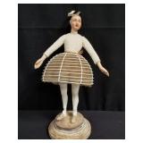 Composite crinoline doll with base