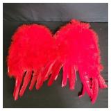 Red costume angel wings