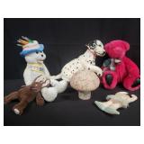 Collection of stuffed animals and dolls