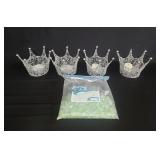 Collection of decorative crown candleholders and