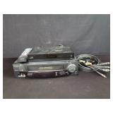 Box of Sharp VHS player,RCA wires etc