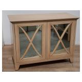 Modern blonde cabinet with glass doors
