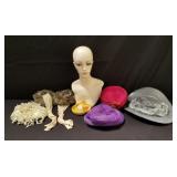 Costume hats and plastic mannequin head