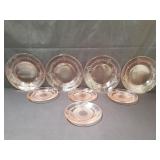 Group of depression pink glass plates and saucers