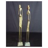 Pair of vintage tribal style brass figures