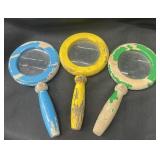 Group of vintage shabby chic magnifying glasses
