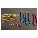 Group of beaded necklaces and earrings
