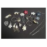 Group of costume jewelry, earrings, brooches, etc.