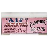Pair of vintage wood frame "Alf" metal sign