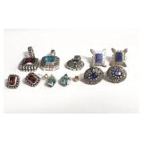 Group of sterling silver earrings and pendants