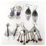 Group of sterling silver earrings with semi