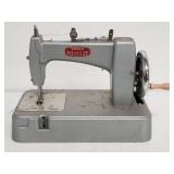 Essex miniature sewing machine in case