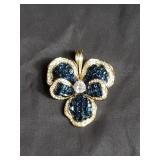 Sterling silver floral brooch with blue and