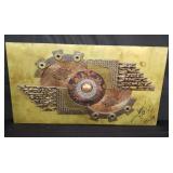 Signed and dated brutalist metal wall sculpture