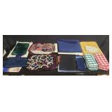 Large box of tablecloths and placemats