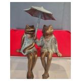 Sophisticated shelf sitter frogs figurine .