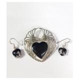Sterling silver, onyx, and marcasite brooch with