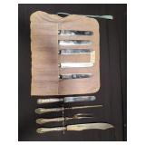 Box of silver plate carving set and dinner knives