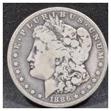 1886-0 Morgan silver dollar coin.