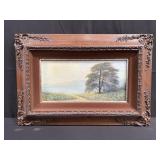 Framed oil on canvas landscape in the style of