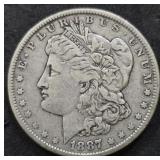 1887 No mint mark Morgan Silver Dollar Coin.