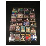 30 baseball trading cards in hard cases